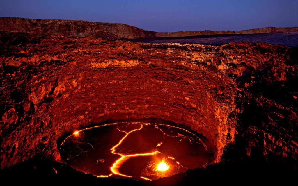 Danakil Depression Tour Guide Erta Ale Volcano in Ethiopia
Danakil Depression Tour Guide Dallol Salt Flats colorful landscape
Danakil Depression Tour Guide Lake Afdera saline lake Ethiopia
Danakil Depression Tour Guide local Afar people Ethiopia
Danakil Depression Tour Guide desert landscape Ethiopia